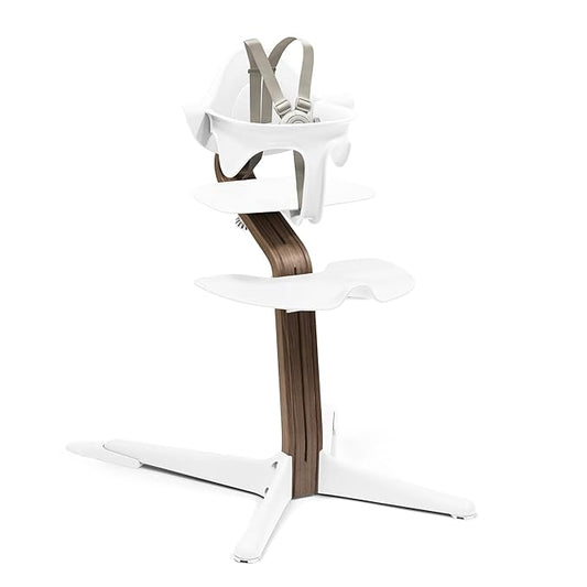Stokke Nomi High Chair, White/Walnut - Inspires Active Sitting - Tool-Free, Seamless Adjustability - Includes Baby Set with Removable Harness for Children 6-24 Months