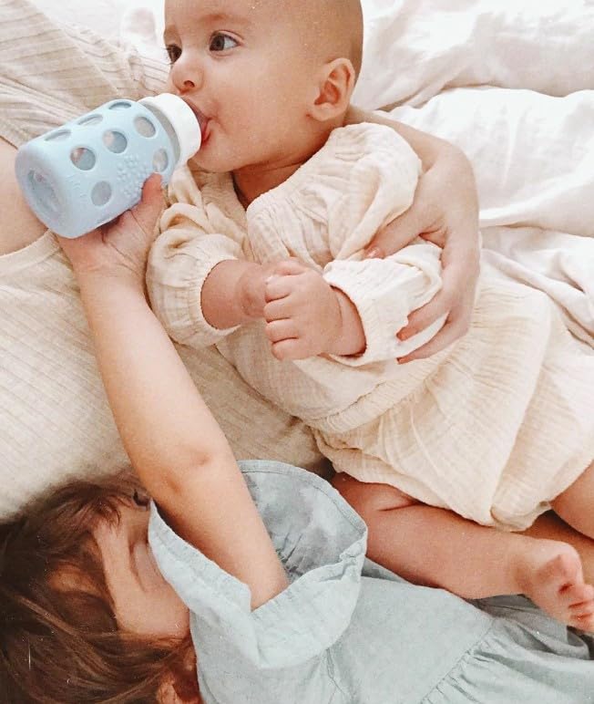 Lifefactory Glass Baby Bottle BPA Free | Protective Silicone Sleeve | 4 oz Pack of 2 | Pink, Sky Blue