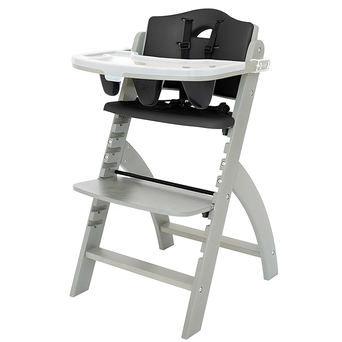 Abiie Beyond Junior Wooden High Chair for Babies and Toddlers - Convertible 3-in-1 Baby Highchair with Removable Tray - 6 Months to 250 Lb - Water Resistant - Misty Grey Wood with Black Pearl Cushion