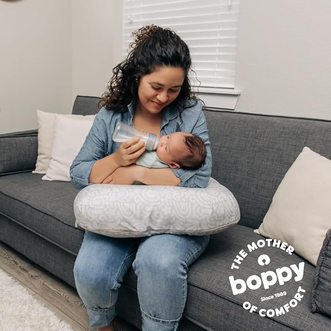 Boppy Nursing Pillow - Firm, Ergonomic U-Shaped Bottle and Breastfeeding Pillow with High Lift for Comfort and Support, Spacious Surface - Cream Retro Squiggles