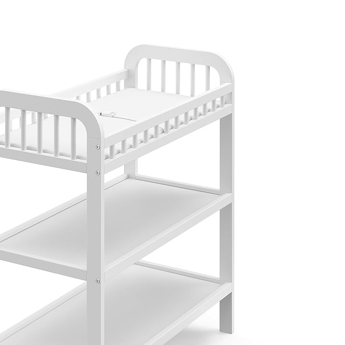 Storkcraft Pasadena Changing Table with Water-Resistant Changing Pad (White) - GREENGUARD Gold Certified, Includes Bonus Water-Resistant Changing Pad with Safety Strap, 2 Open Shelves