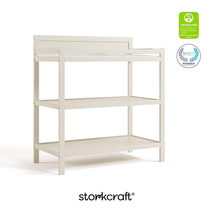 Storkcraft Alpine Changing Table (Frosted Oat) - Includes Water Resistant Changing Pad with Safety Strap, 2 Open Shelves for Storage
