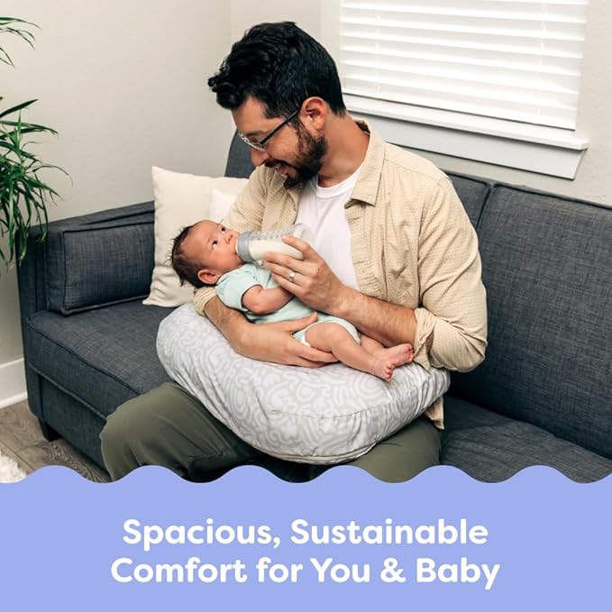 Boppy Nursing Pillow - Firm, Ergonomic U-Shaped Bottle and Breastfeeding Pillow with High Lift for Comfort and Support, Spacious Surface - Cream Retro Squiggles
