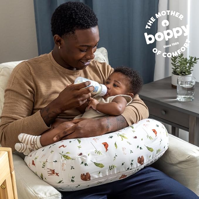 Boppy Nursing Pillow - Firm, Ergonomic U-Shaped Bottle and Breastfeeding Pillow with High Lift for Comfort and Support, Spacious Surface - Neutral Plants and Animals
