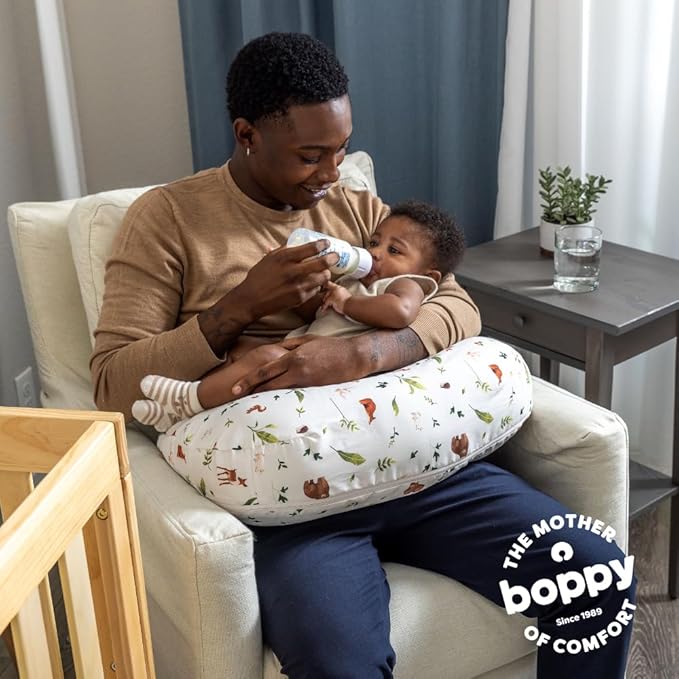 Boppy Nursing Pillow - Firm, Ergonomic U-Shaped Bottle and Breastfeeding Pillow with High Lift for Comfort and Support, Spacious Surface - Neutral Plants and Animals