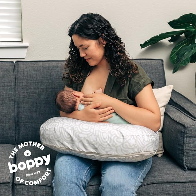 Boppy Nursing Pillow - Firm, Ergonomic U-Shaped Bottle and Breastfeeding Pillow with High Lift for Comfort and Support, Spacious Surface - Cream Retro Squiggles