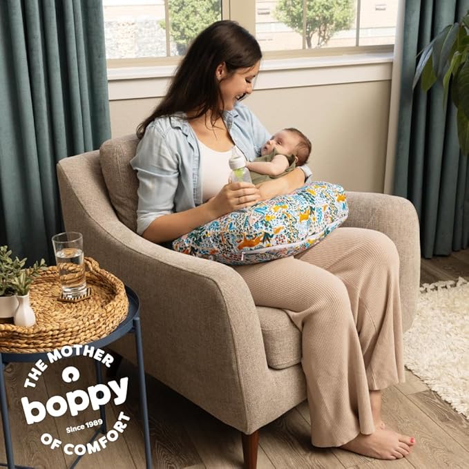 Boppy Nursing Pillow - Firm, Ergonomic U-Shaped Bottle and Breastfeeding Pillow with High Lift for Comfort and Support, Spacious Surface - Colorful Forest Animals