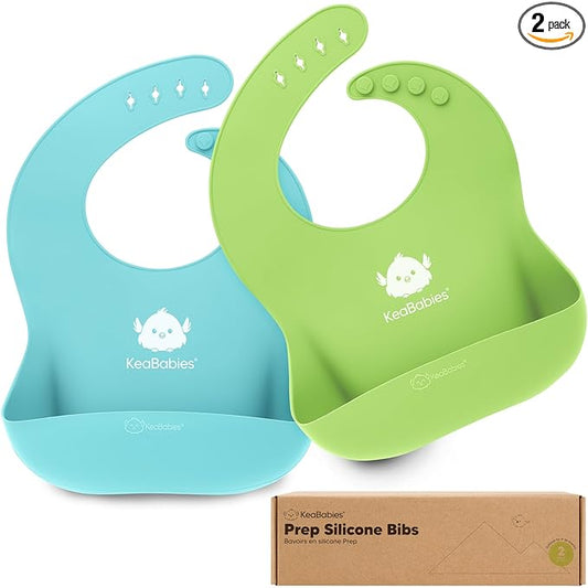 KeaBabies 2-Pack Silicone Bibs for Babies, Toddlers Girl, Boy – Sturdy Food-Grade Baby Bibs for Eating, Large Food Catcher, Clean & Put On Easily, Waterproof Toddler Feeding Essentials (Cloud Nine)