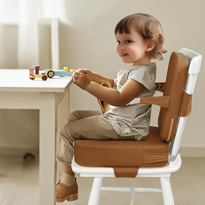 Eiury Toddler Booster Seat for Dining Table – Non-Slip PU Waterproof Cushion with Backrest & Adjustable Straps, Portable Baby Booster Seat (Brown)