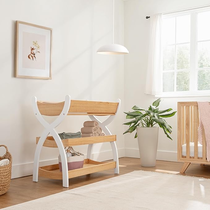 Comfy Cubs Baby Changing Table - Sturdy Wood Construction, Timeless Look Baby Change Table with Two Open Shelves for Infant Daycare Essentials Storage - Natural Wood with White Legs