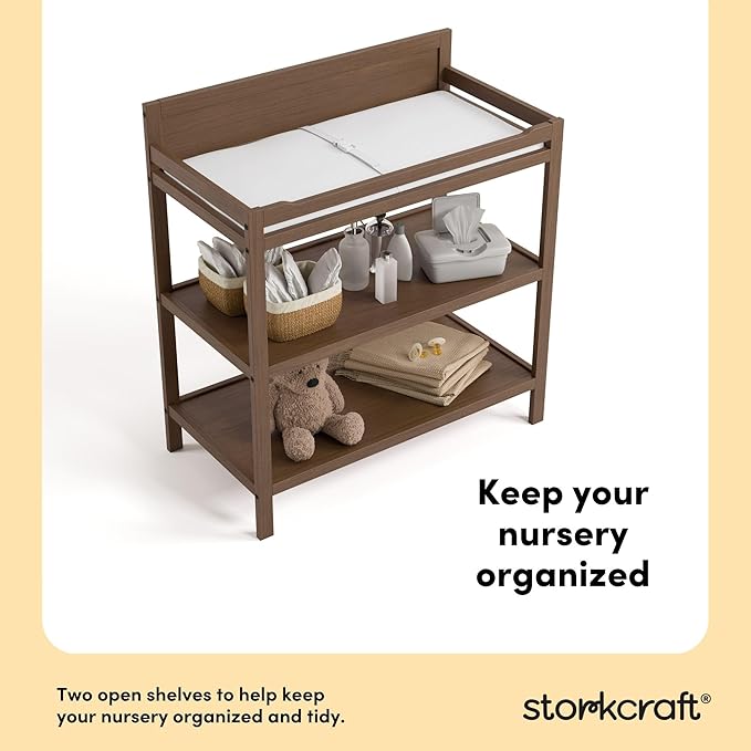 Storkcraft Alpine Changing Table (Hazelnut) - Includes Water Resistant Changing Pad with Safety Strap, 2 Open Shelves for Storage