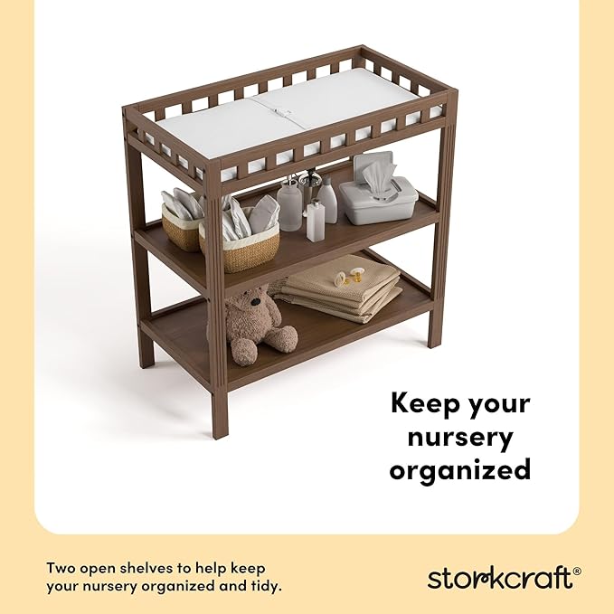 Storkcraft Morningside Changing Table (Hazelnut) – GREENGUARD Gold Certified Baby Changing Table, Includes Waterproof Diaper Changing Pad, Easy 30-Minute Assembly, 2 Open Shelves for Storage