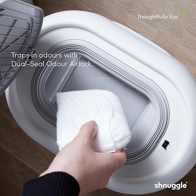 Shnuggle Changing Essentials Bundle - Squishy Changing Mat Taupe + Eco-Touch Diaper Bin + Better Bag Liners - Wipeable, Odor-Locking, Eco-Friendly, No Costly Refills
