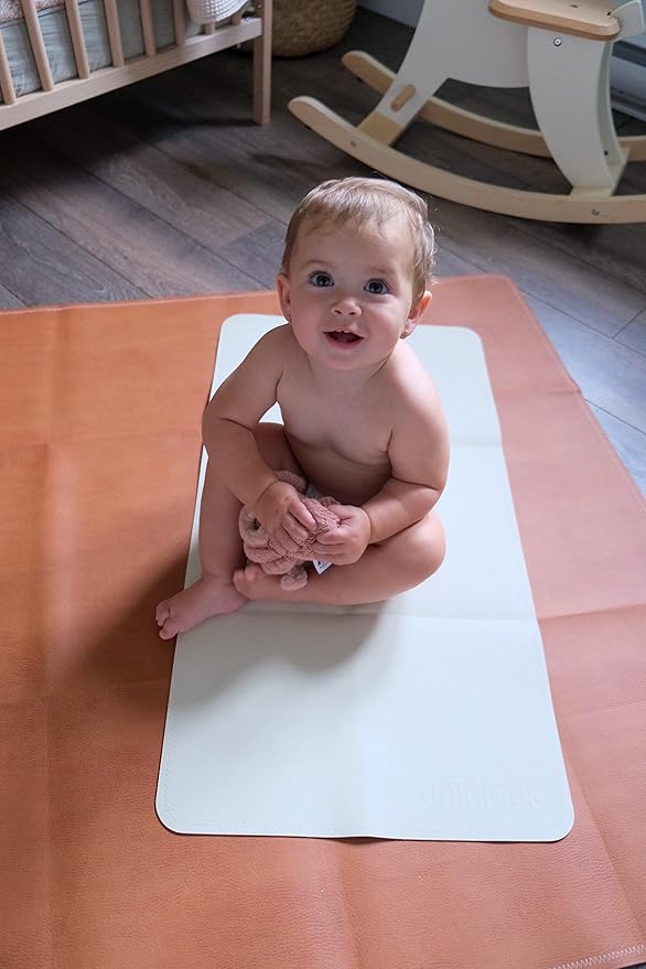 Vegan Leather Changing Mat by UNIKLOOK | Baby Infant Toddler Multipurpose | Waterproof Diaper Pad Placement Pet or Desk Mat Portable Foldable for Travel Wipeable Double Sided (14x22 in) Blanc + Rose