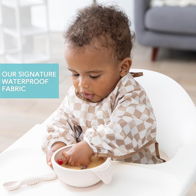 Bumkins - Sleeved Bib -For Boys & Girls, Babies & Toddlers 6-24 Months - Lightweight, Durable, Waterproof - Long Sleeve Bib - Catch-All Pocket - Wipeable & Machine Washable -Beige & Gray Check -2 Pack
