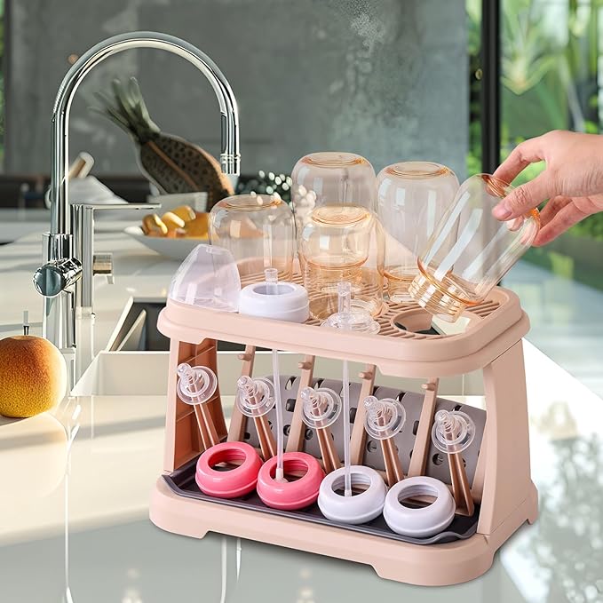 Baby Bottle Drying Rack with Brush & Dishwasher Basket - Space Saving Standing Drying Rack for Baby Bottles, Pump Parts & Accessories, Compact Organizer Holds Up to 8 Bottles (Pink Lotus Root)