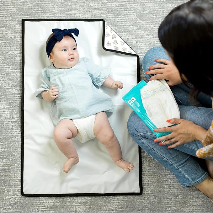 Disney Baby by J.L. Childress Full Body Portable Changing Pad for Babies - Diaper Changing Mat for Travel, Baby Accessory Essentials, Wipeable & Water-Resistant, Foldable & Compact - Minnie Mouse Dot