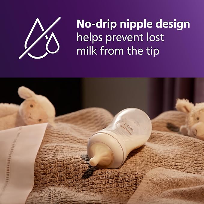 Philips Avent Natural Response Baby Gift Set - 3X 4oz Bottles with Slow Flow Nipple (Level 2), 2X 9oz Bottles with Medium Flow Nipple (Level 3), 2 Extra Nipples, 2X Soothie Pacifiers 0-3m, SCD838/02
