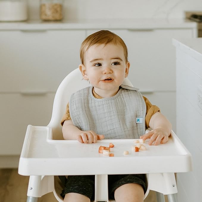 Little Unicorn Muslin Baby Bibs | Adjustable as Baby Grows | Soft Absorbent Muslin Fabric | For Eating, Drooling, Teething (Tropical Leaf)