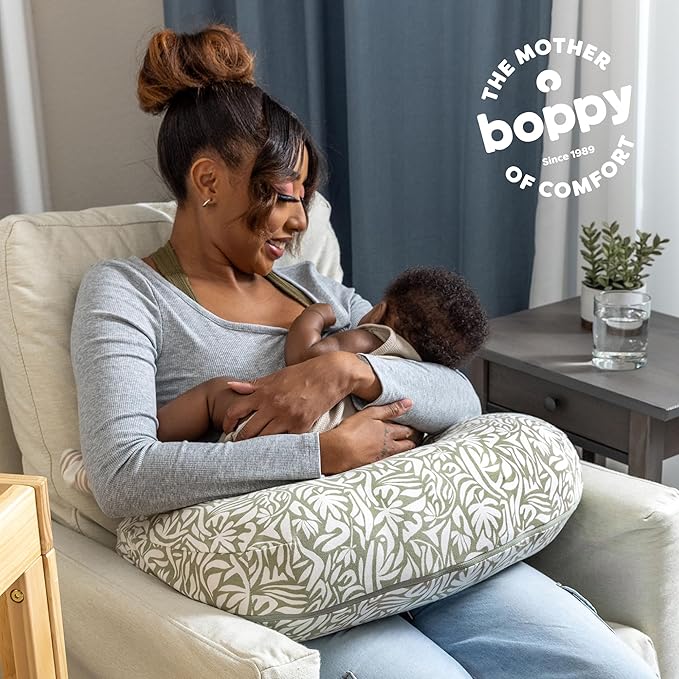 Boppy Nursing Pillow - Ergonomic Bottle & Breastfeeding Pillow, Higher, Firmer & Larger, Water-Repellent with Washable Organic Cotton Cover, Baby Safety Alliance Verified - Green Cut Out Leaves