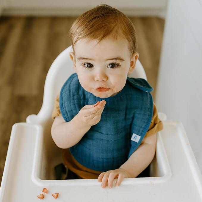 Little Unicorn Muslin Baby Bibs | Adjustable as Baby Grows | Soft Absorbent Muslin Fabric | For Eating, Drooling, Teething (Dino Friends)