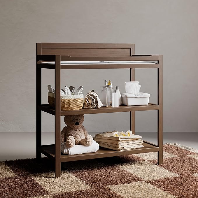 Storkcraft Alpine Changing Table (Hazelnut) - Includes Water Resistant Changing Pad with Safety Strap, 2 Open Shelves for Storage