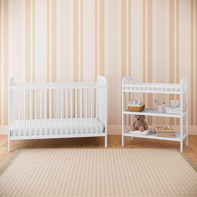Storkcraft Pasadena Changing Table with Water-Resistant Changing Pad (White) - GREENGUARD Gold Certified, Includes Bonus Water-Resistant Changing Pad with Safety Strap, 2 Open Shelves