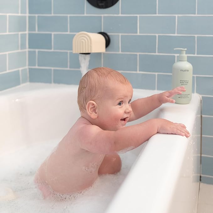 mushie Bath Spout Cover | Soft Silicone Bathtub Faucet Safety Guard for Kids | Universal Fit (Tradewinds)